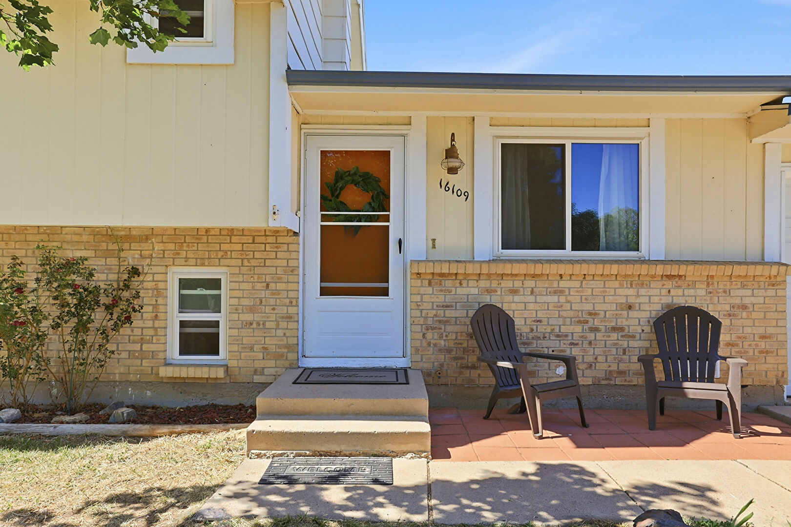 Exterior Entry at 16109 East Montana Place, Aurora, CO 80017, listed by Angela Kemper, MLS ID: 3571601