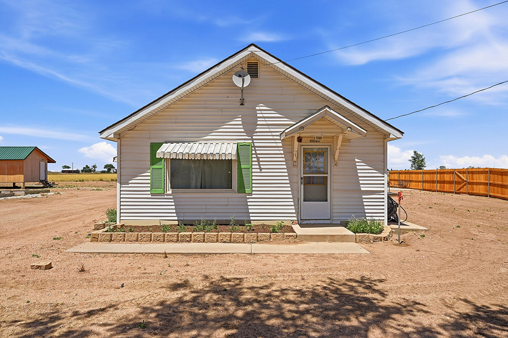 Front at 21081 County Road 66, Greeley, CO 80631, listed by Brad Inhulsen