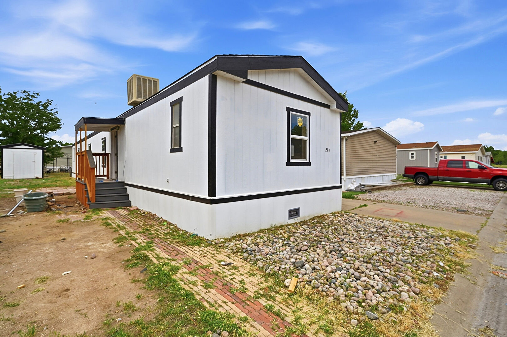 Front at 4412 East Mulberry Street, Lot 294, Fort Collins, CO 80524, listed by Jose Hernandez