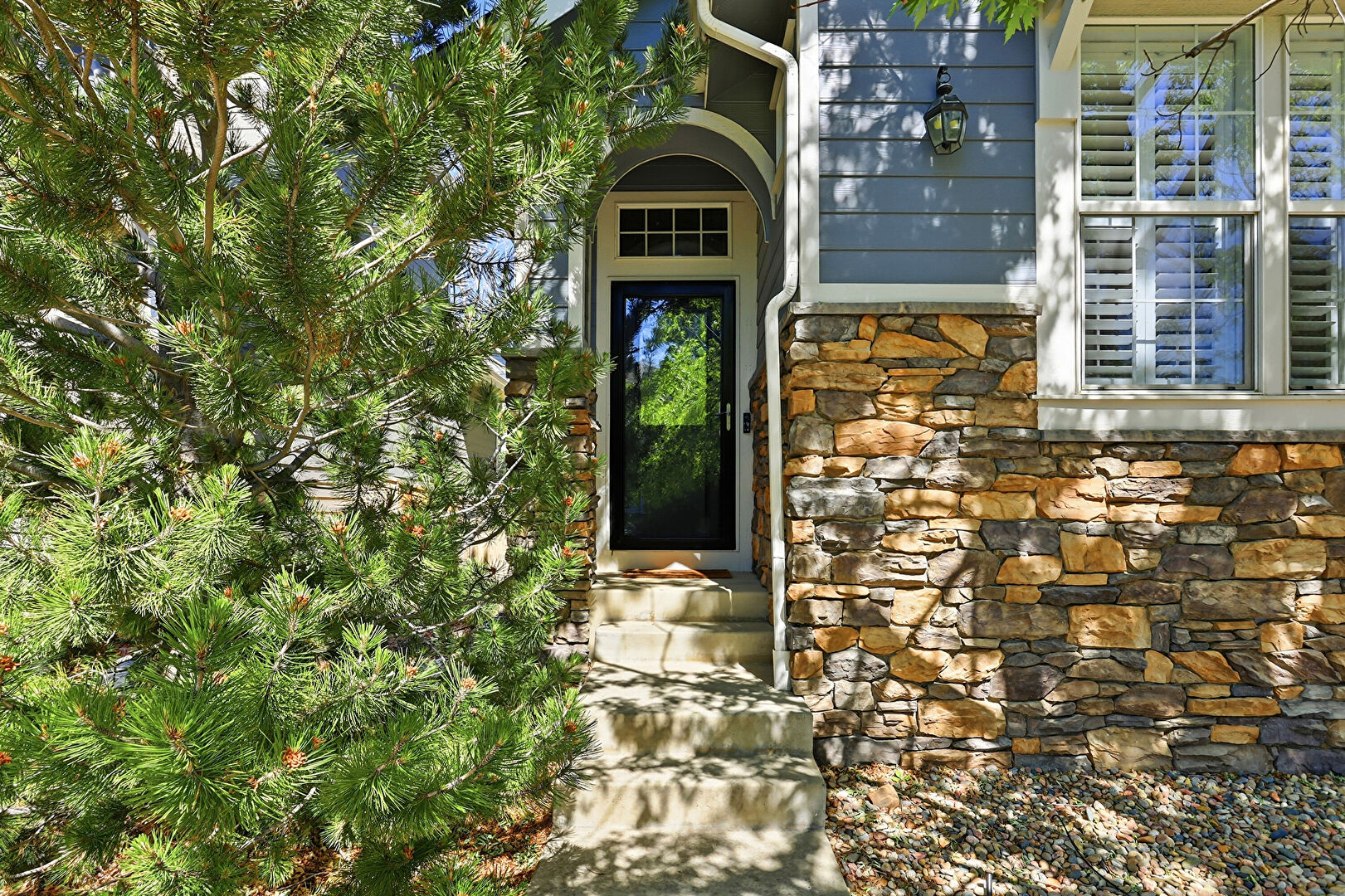 Exterior Entry at 10655 Riverbrook Circle, Highlands Ranch, CO 80126, listed by Regina Naves, MLS ID: 4526366