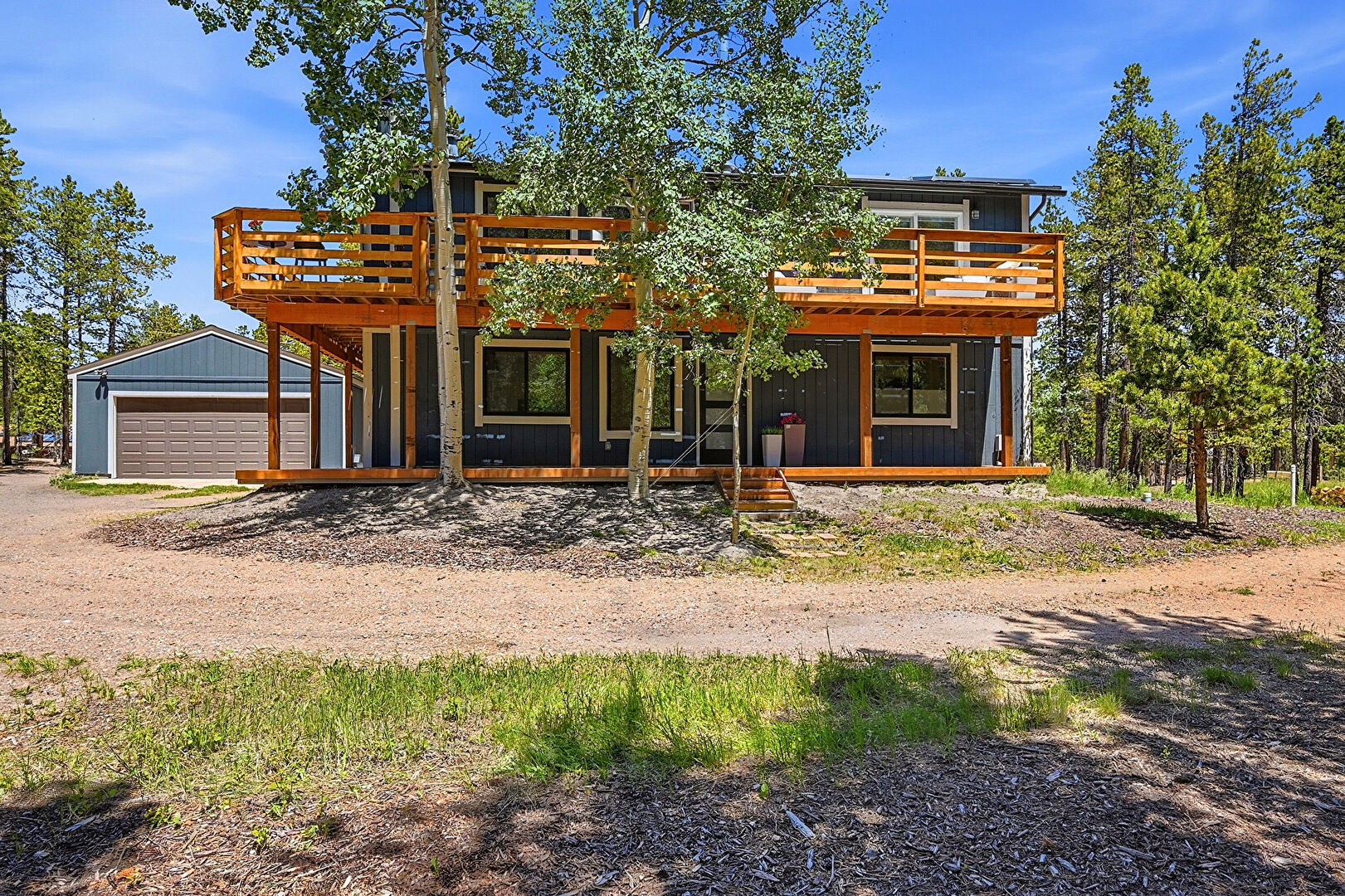 Front at 31556 Griffin Drive, Conifer, CO 80433, listed by Jacqueline Neal, MLS ID: 6197592