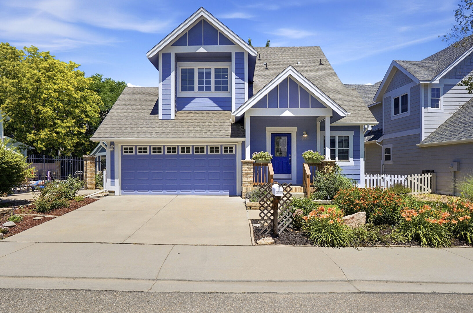 Front at 2306 Watersong Circle, Longmont, CO 80504, listed by Dina James Young