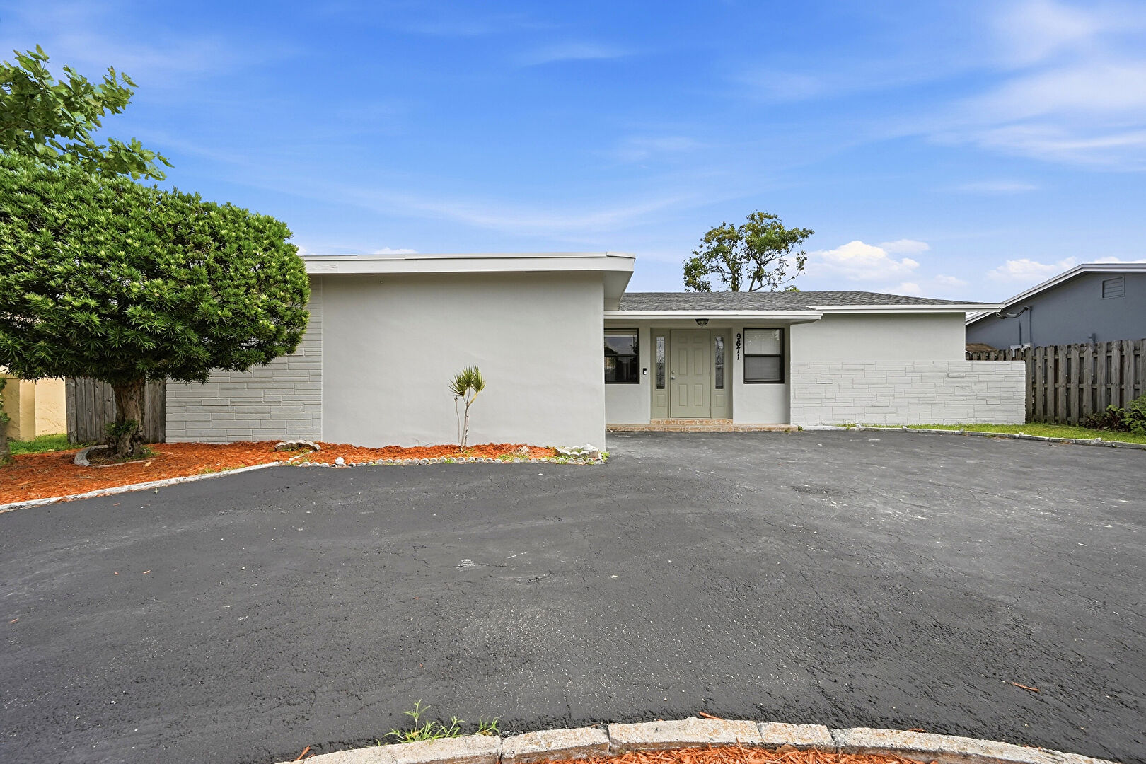 Front at 9671 Northwest 24th Street, Sunrise, FL 33322, listed by Ravi Mohanka