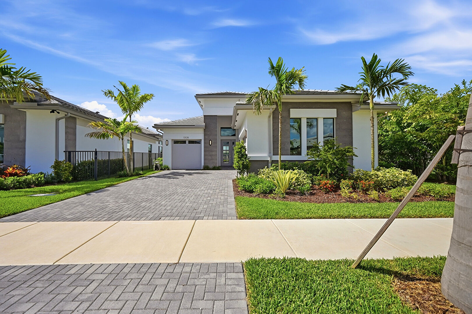 Front at 13128 Feathering Way, Palm Beach Gardens, FL 33412, listed by Ravi Mohanka