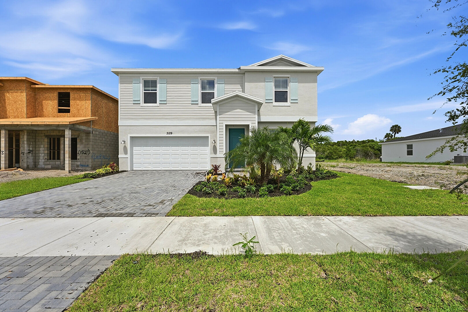 Front at 3129 Spanish Cedar Place, Fort Pierce, FL 34946, listed by Ravi Mohanka