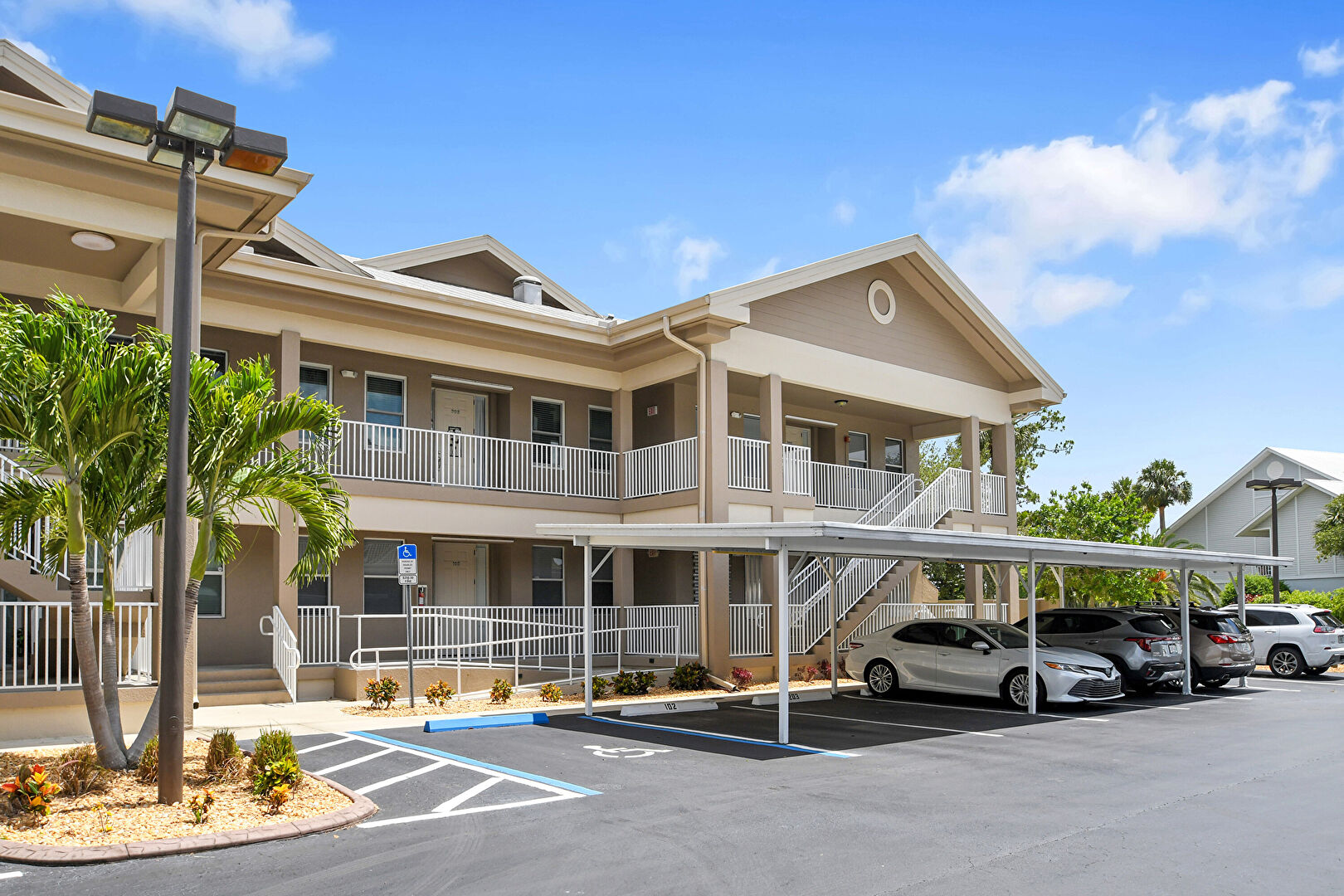 Front at 15250 Riverbend Boulevard, 202, North Fort Myers, FL 33917, listed by Mary Dickey