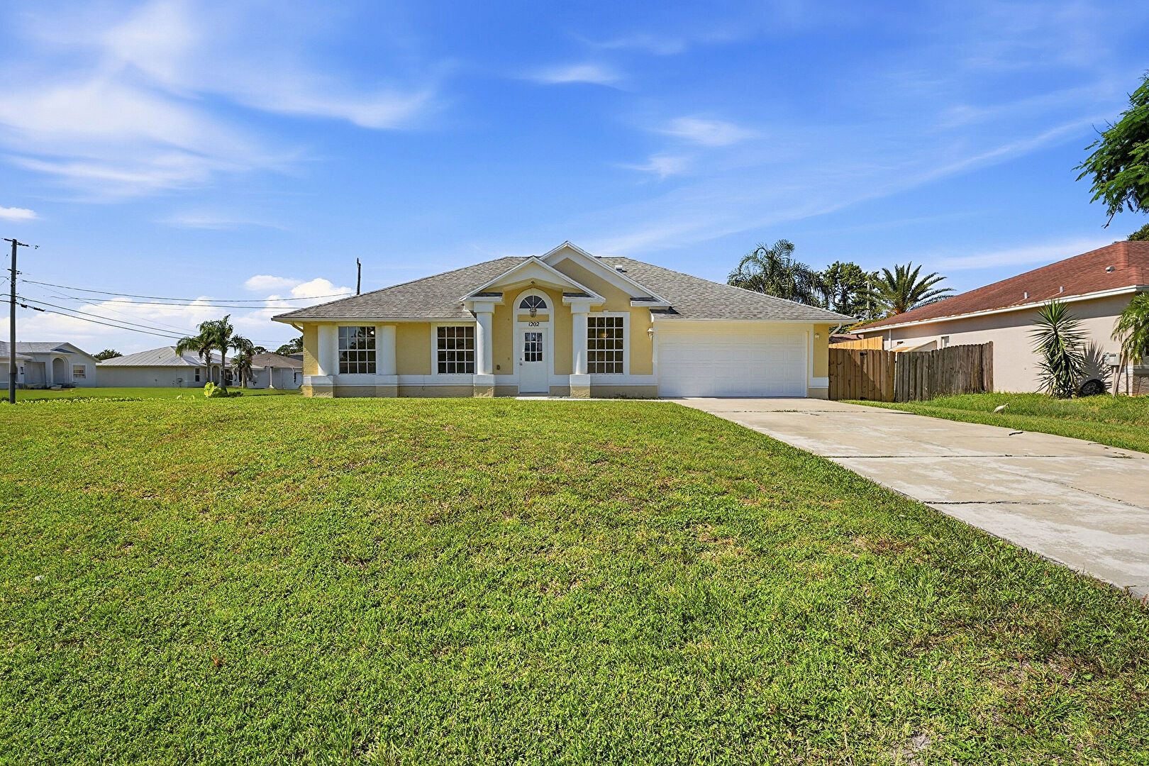 Front at 1202 Southwest Jacqueline Avenue, Port St. Lucie, FL 34953, listed by Richele Sirak