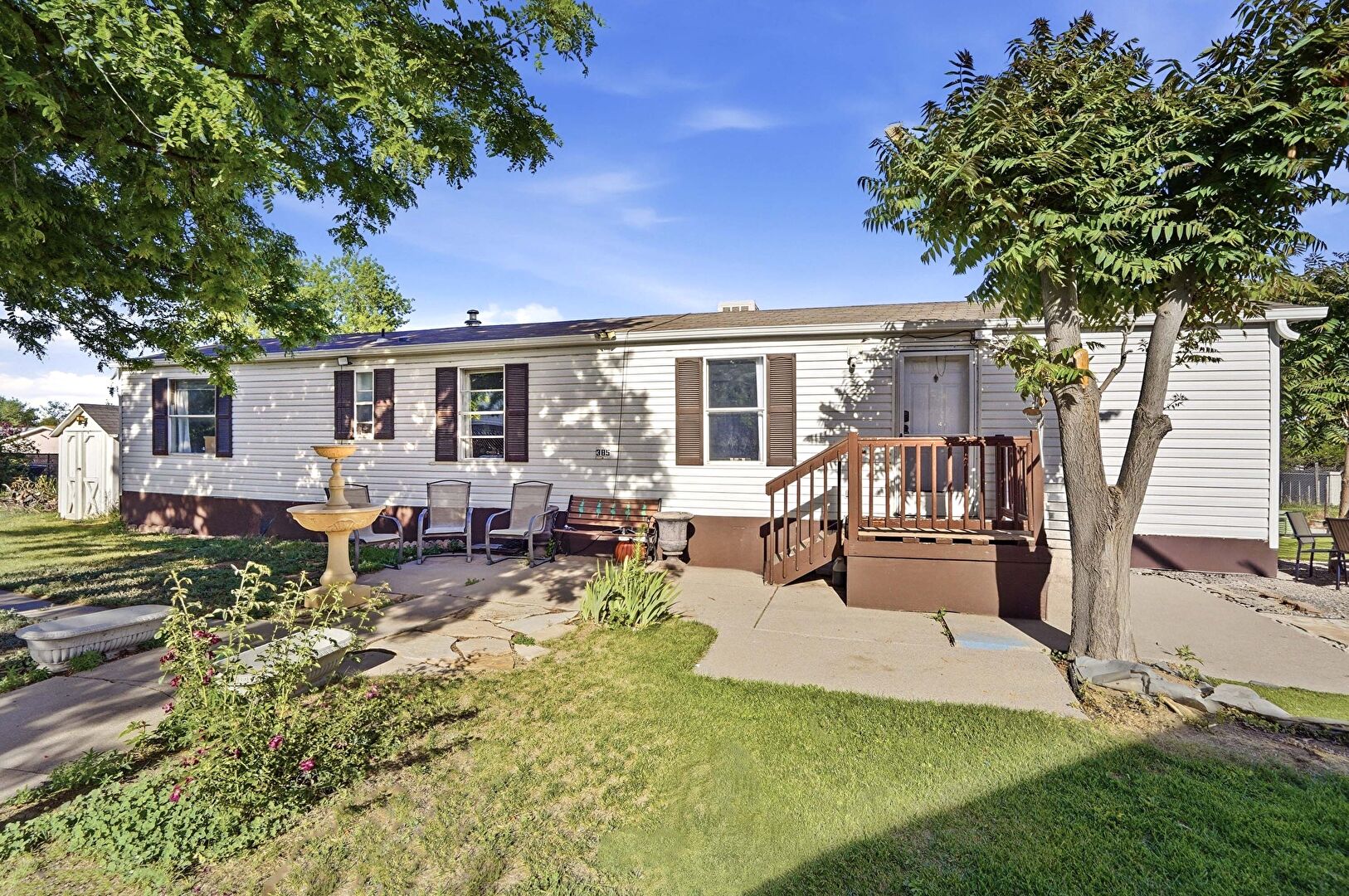 Front at 4211 East 100th Avenue lot 385, Thornton, CO 80229, listed by Idalia Padilla