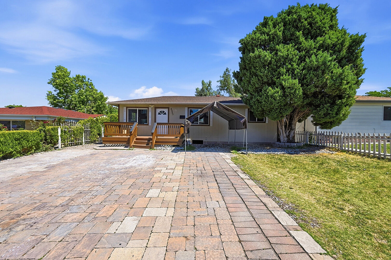Front at 5355 East Asbury Avenue, Denver, CO 80222, listed by Cesar Pena