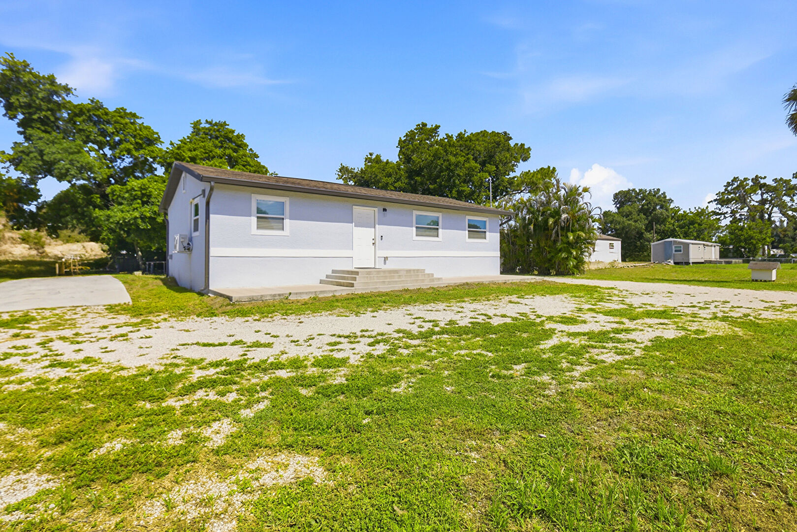 Front at 8338 McDaniel Drive, North Fort Myers, FL 33917, listed by Nelica Krekic