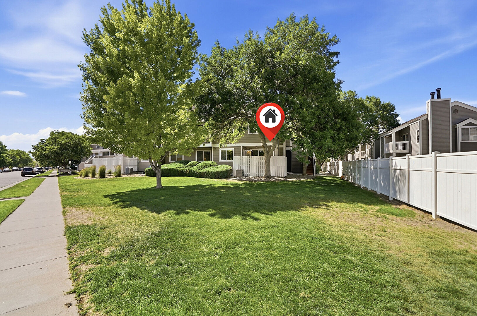Front at 8095 East Colorado Avenue, Unit #2, Denver, CO 80231, listed by Sarah Talcott