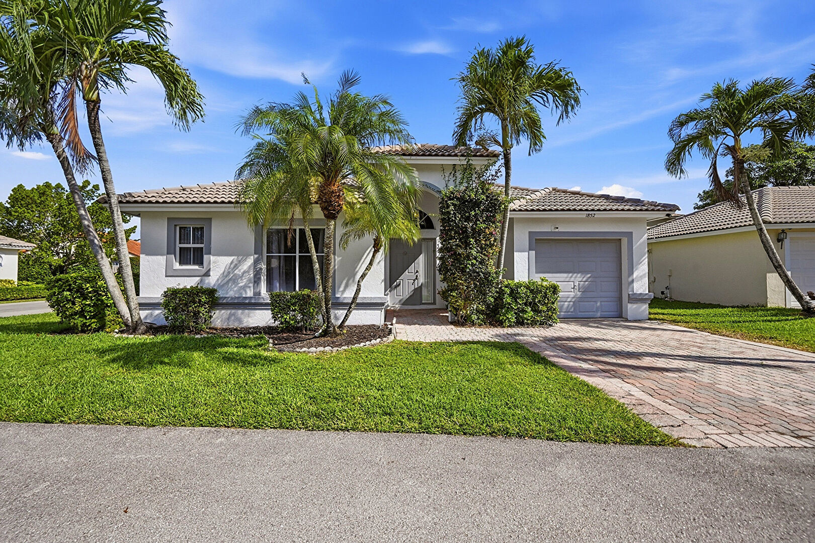 Front at 1852 Capeside Circle, Wellington, FL 33414, listed by Leigh Smith- Tourino, MLS ID: B26040712
