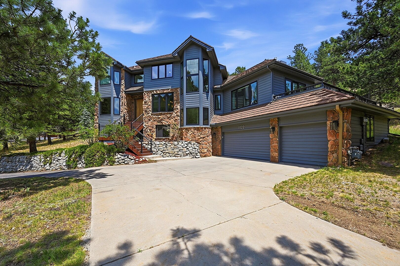 Front at 1922 Baldy Lane, Evergreen, CO 80439, listed by Pandora & John Erlandson, MLS ID: 5214287