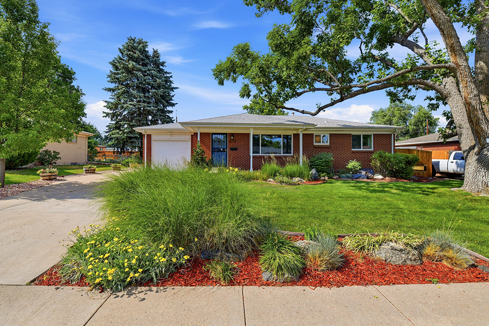 Front at 3323 West Monmouth Avenue, Englewood, CO 80110, listed by Tatyana Sturm