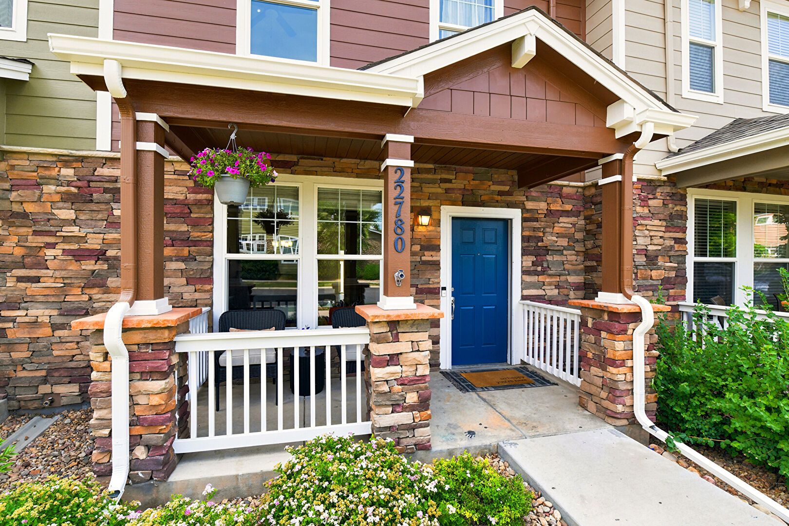 Exterior Entry at 22780 East Briarwood Place, Aurora, CO 80016, listed by Emily Davis, MLS ID: 7750149
