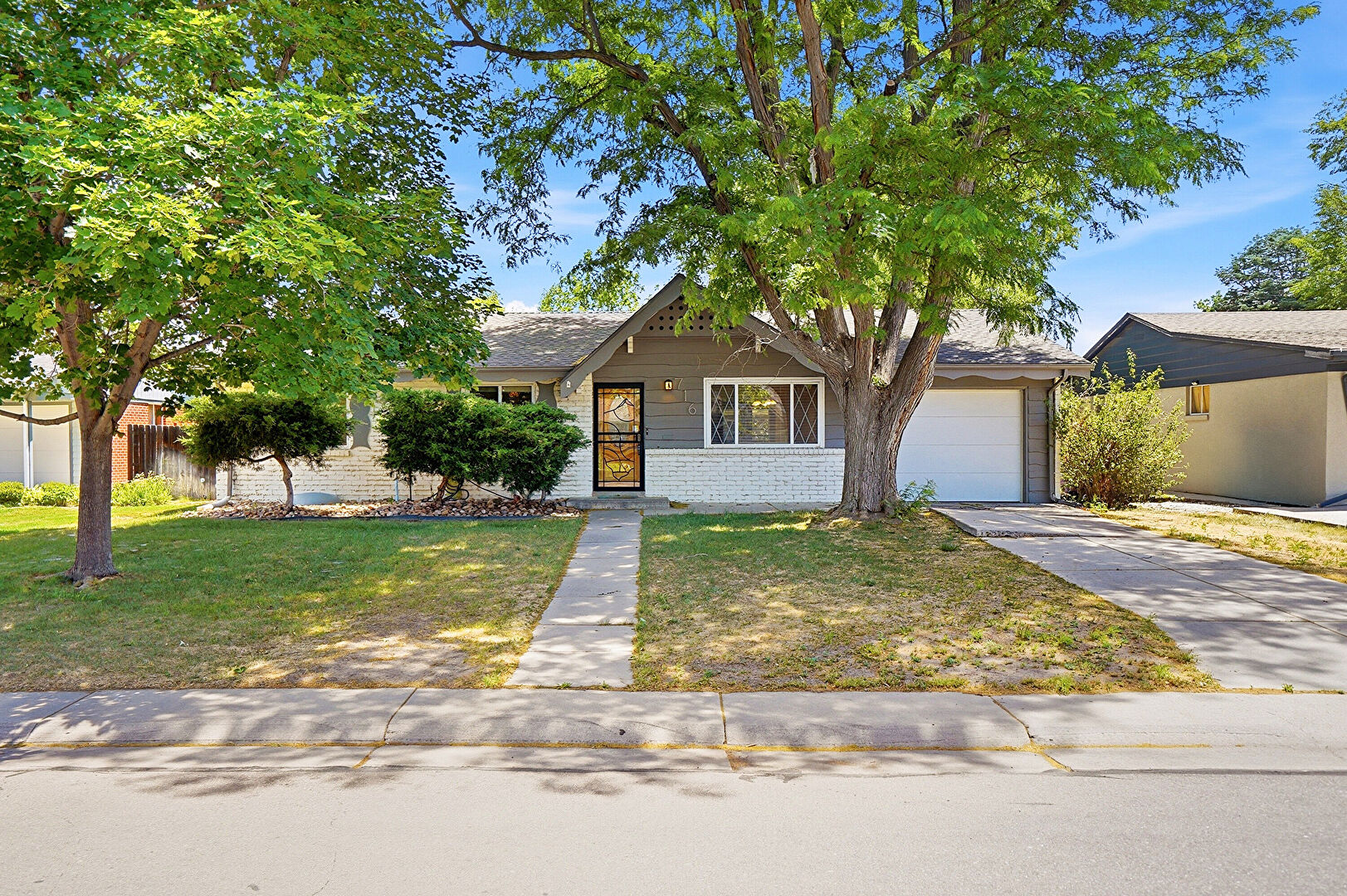 Front at 716 South Jersey Street, Denver, CO 80224, listed by Taylor Haas
