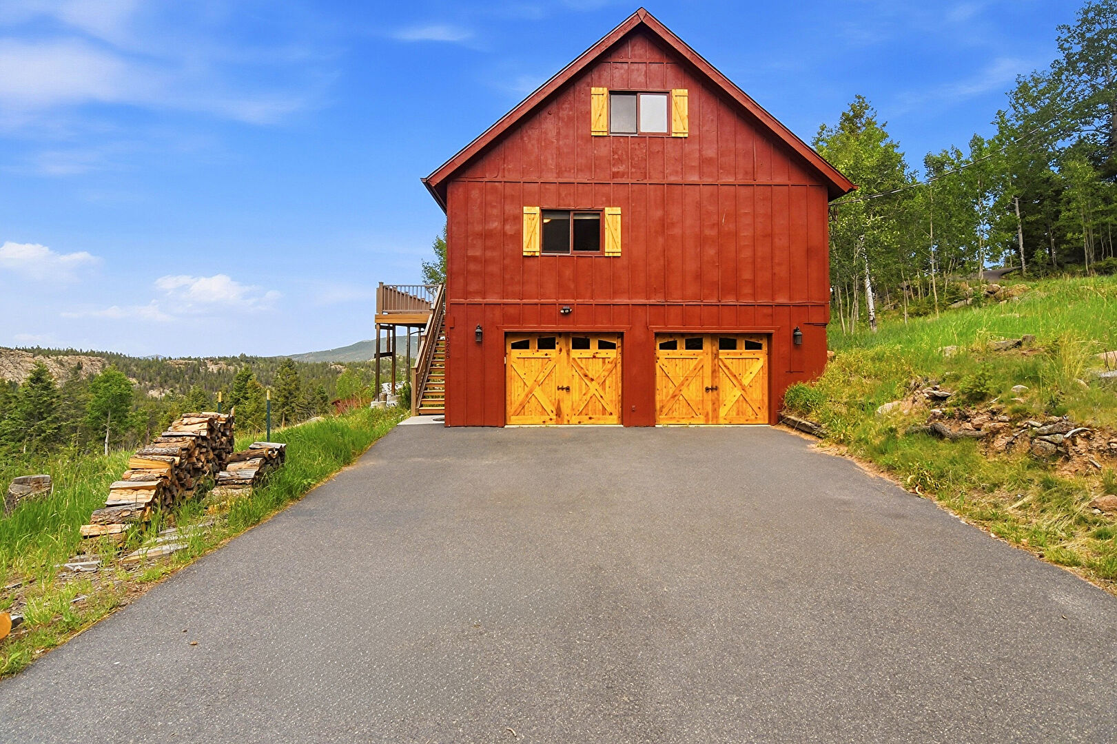 Exterior of Property Entrance to Garage at 10228 Christopher Drive, Conifer, CO 80433, listed by Katie Metzger