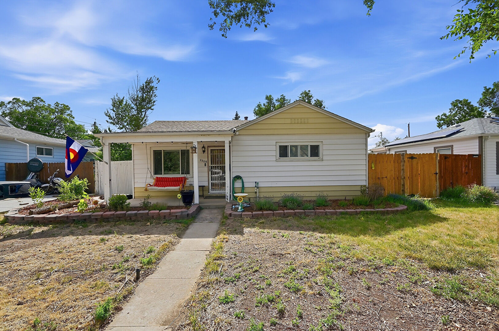 Front at 2309 Newark Street, Aurora, CO 80010, listed by Elena Dominguez
