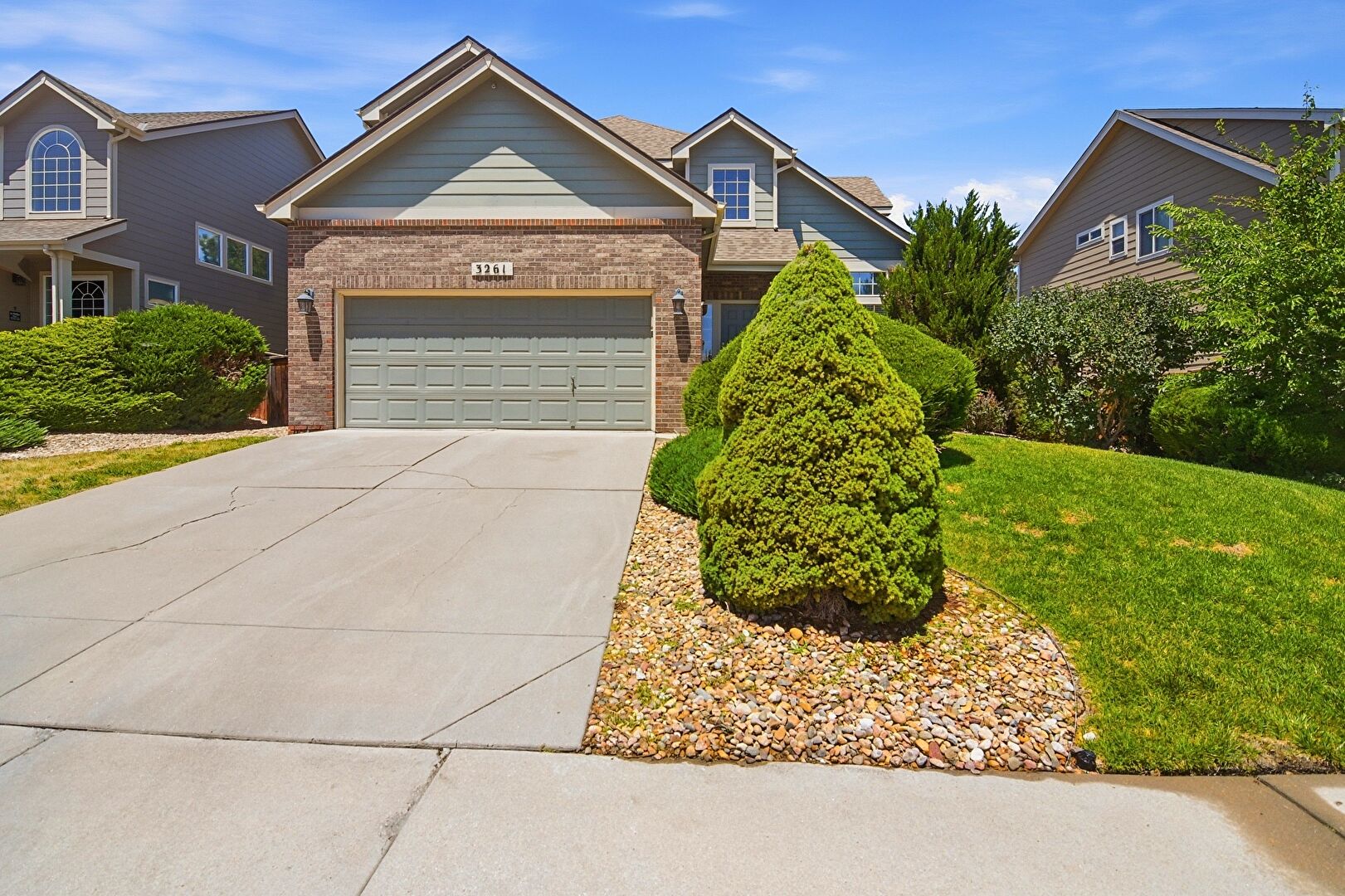 Front at 3261 East 102nd Court, Thornton, CO 80229, listed by Hugh Shaddox