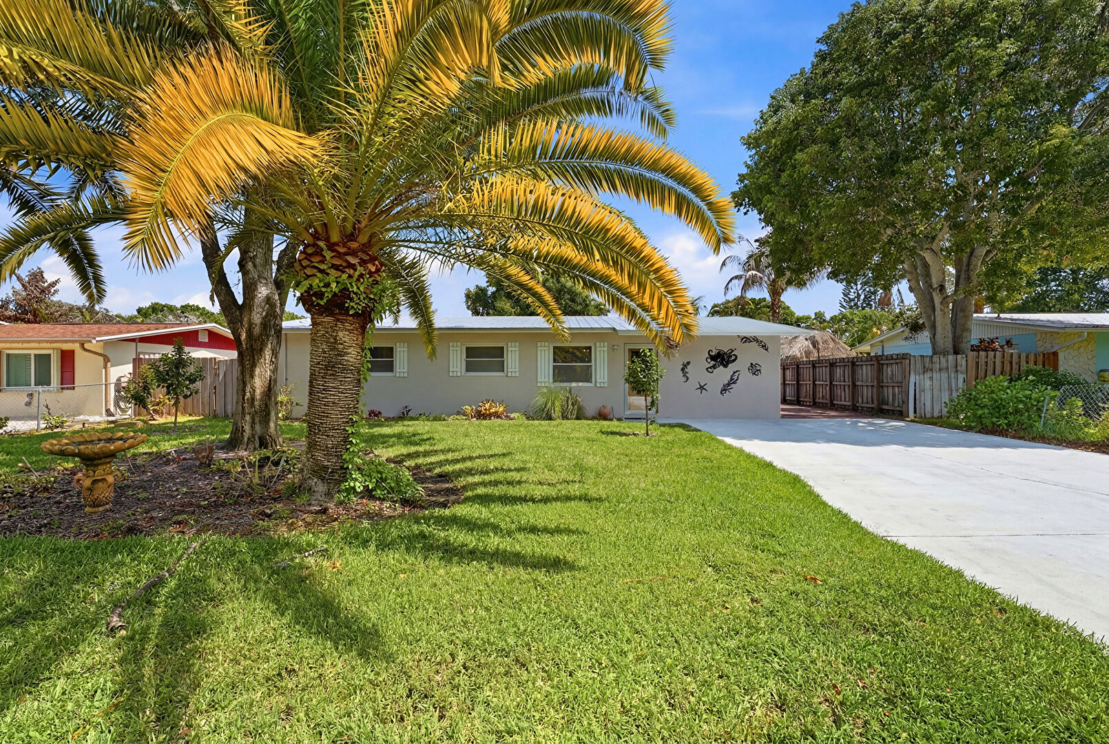Front at 1095 Northeast Tuxedo Terrace, Jensen Beach, FL 34957, listed by Jason M Coley