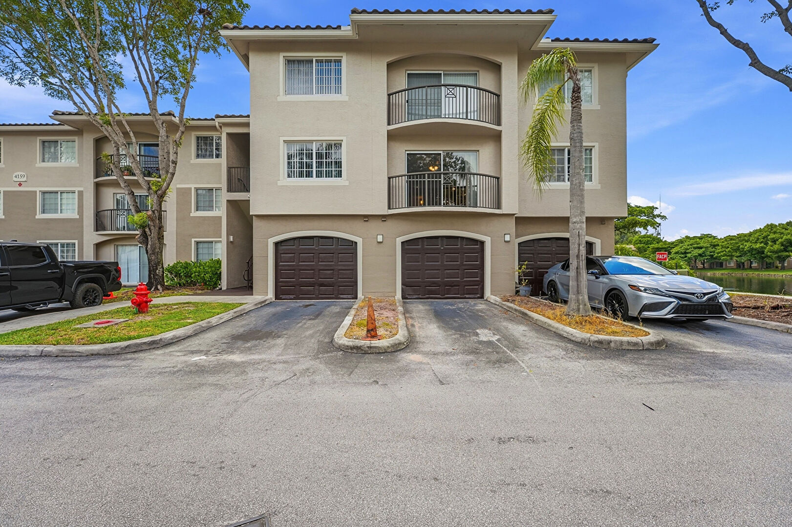 Front at 4159 North Haverhill Road, West Palm Beach, FL 33417, listed by Sabrina McClover