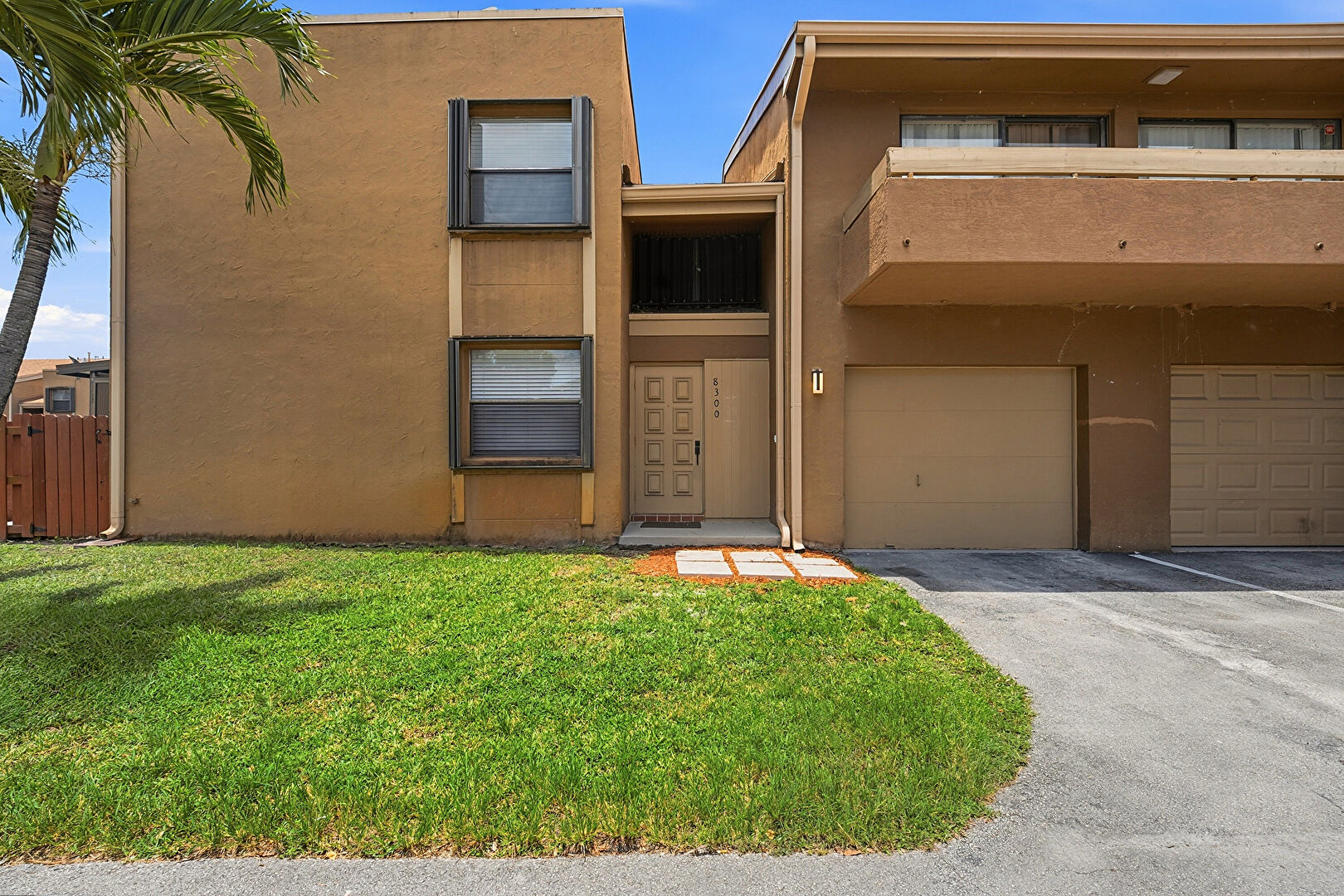 Front of Structure at 8300 East Missionwood Drive, Miramar, FL 33025, listed by Devin Kalvaitis