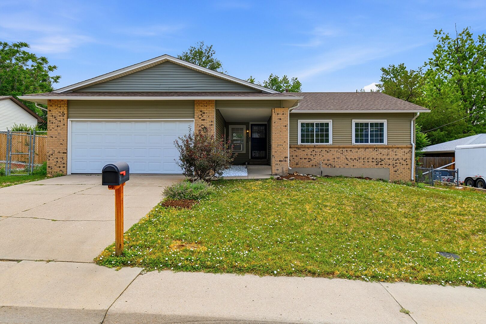 Front at 6332 Depew Street, Arvada, CO 80003, listed by Debra Graves