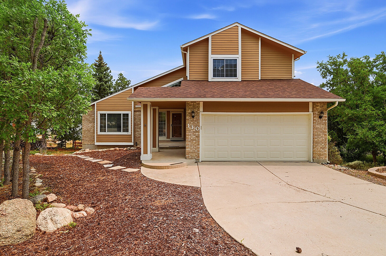Front at 110 Mobray Court, Colorado Springs, CO 80906, listed by Taylor Haas