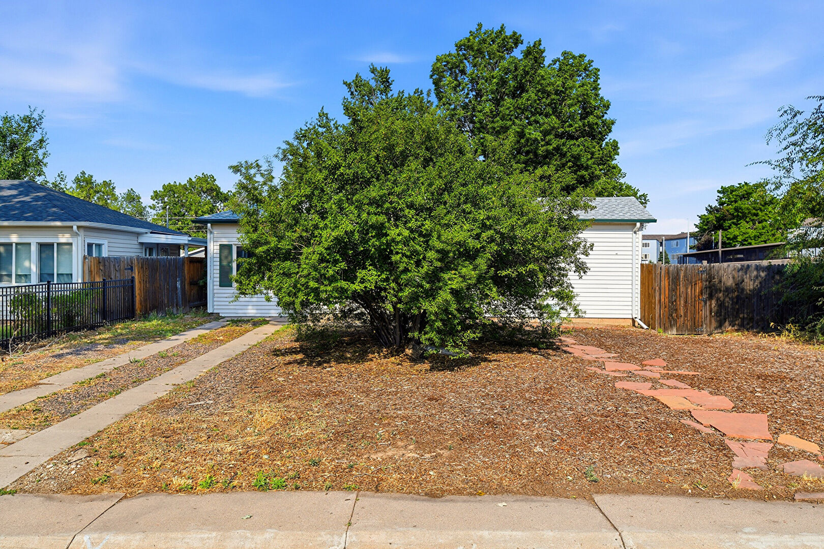 Front at 1200 Spruce Street, Denver, CO 80220, listed by Taylor Haas