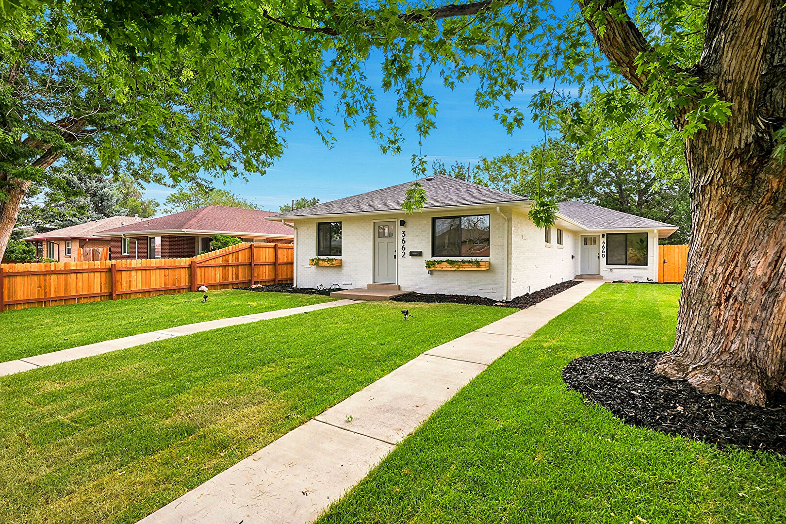 Front at 3660 N Grape St, Denver, CO 80207, listed by Shawn Kane