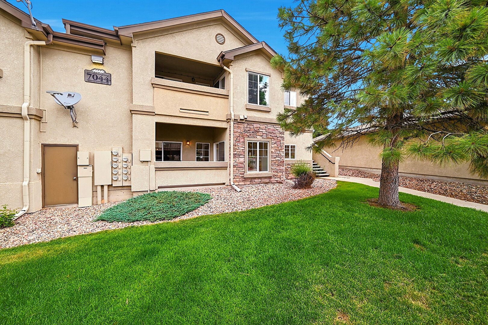 Front at 7044 Ash Creek Heights, #104, Colorado Springs, CO 80922, listed by Terry Moss