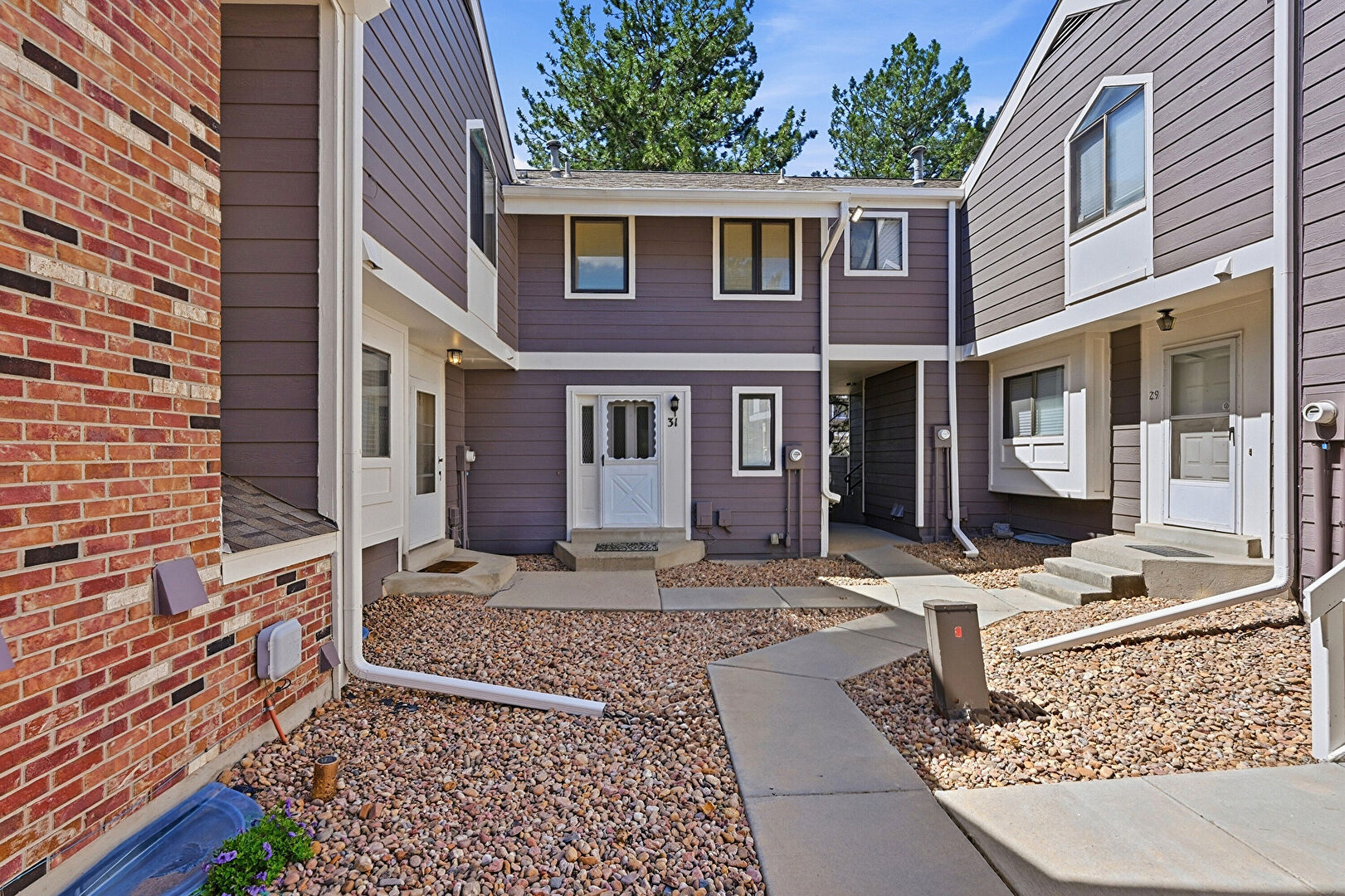 Front at 6855 W. 84th Way #32, Arvada, CO 80003, listed by Valerie Skorka Westmark