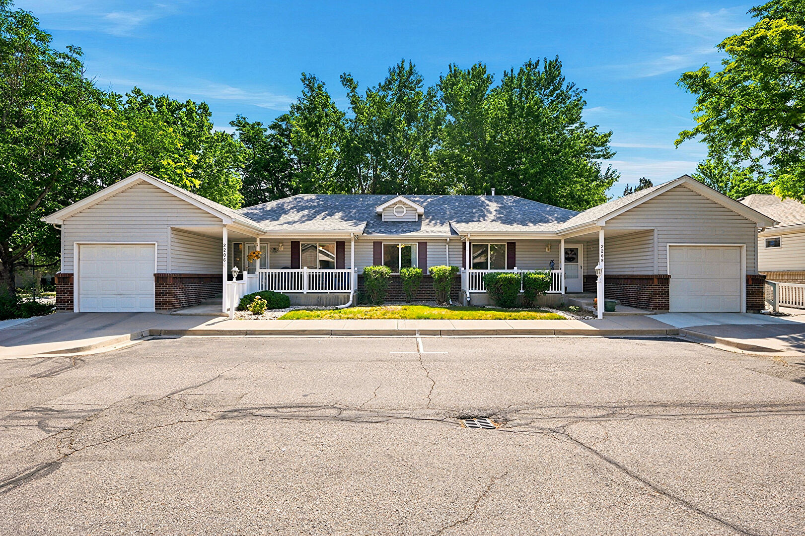 Front at 2206 South Iola Court, Aurora, CO 80014, listed by Julie Leins