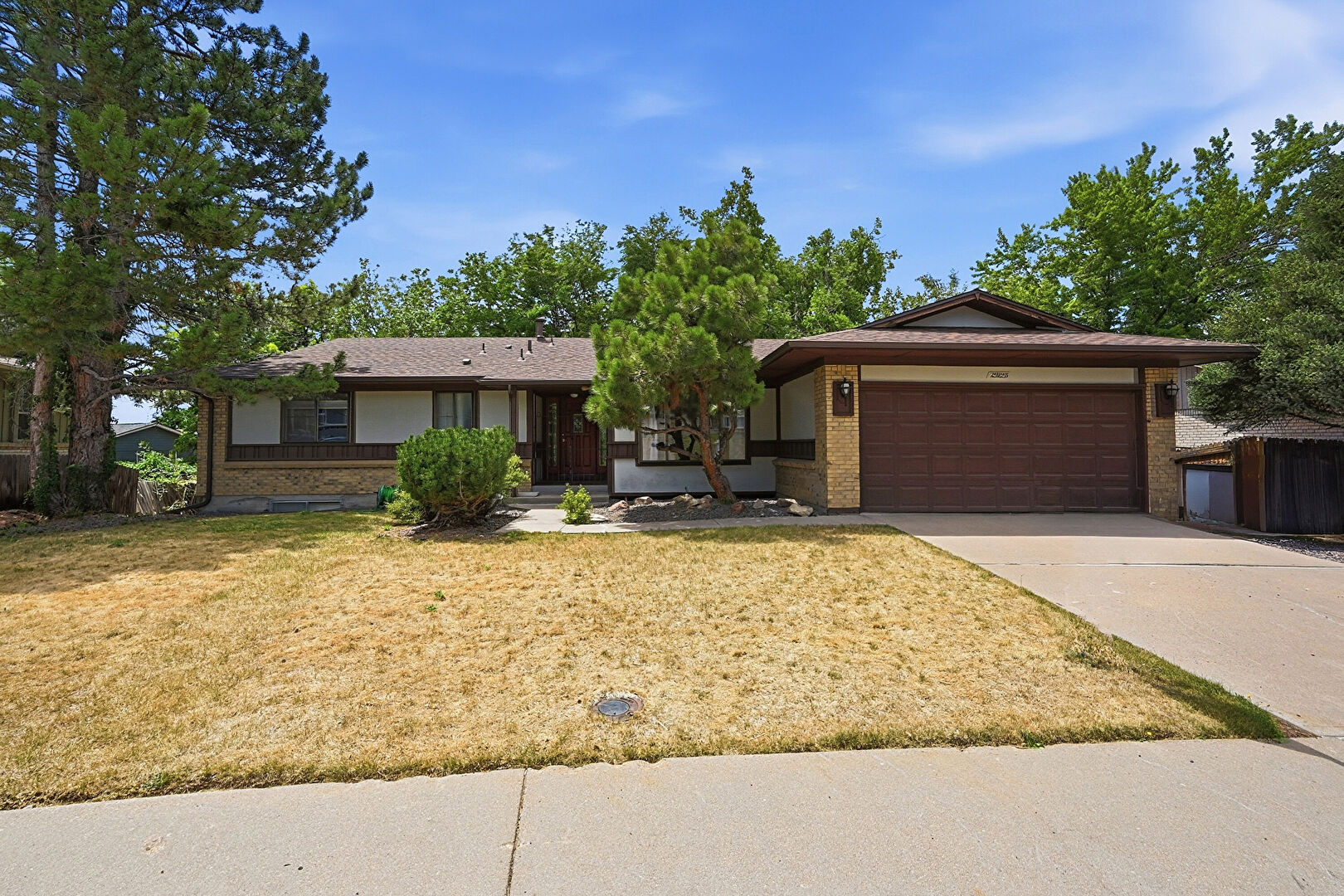 Front at 2923 South Reading Court, Denver, CO 80231, listed by Brenda Moore