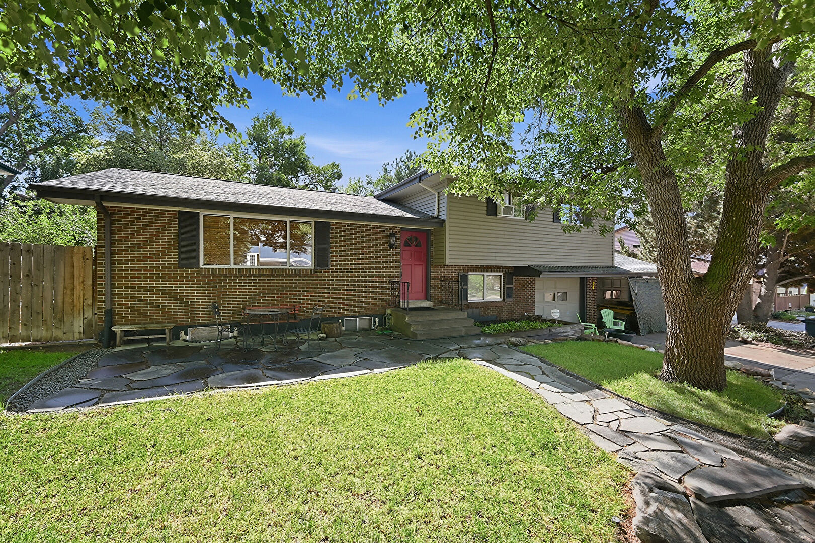 Front at 6612 Welch Court, Arvada, CO 80004, listed by Chandler Lisle