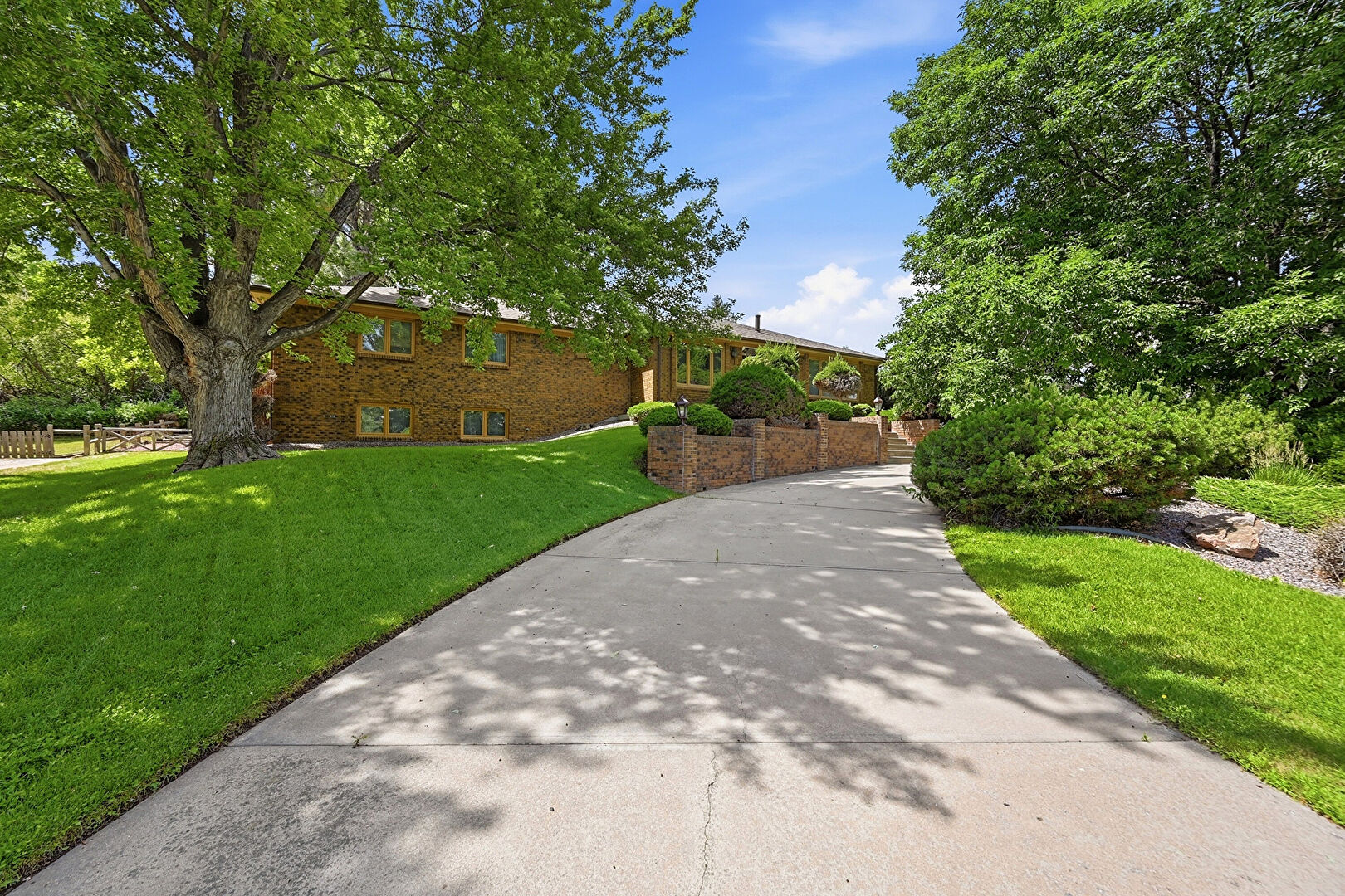 Front at 30 Dutch Creek Drive, Littleton, CO 80123, listed by Lynn Strobel