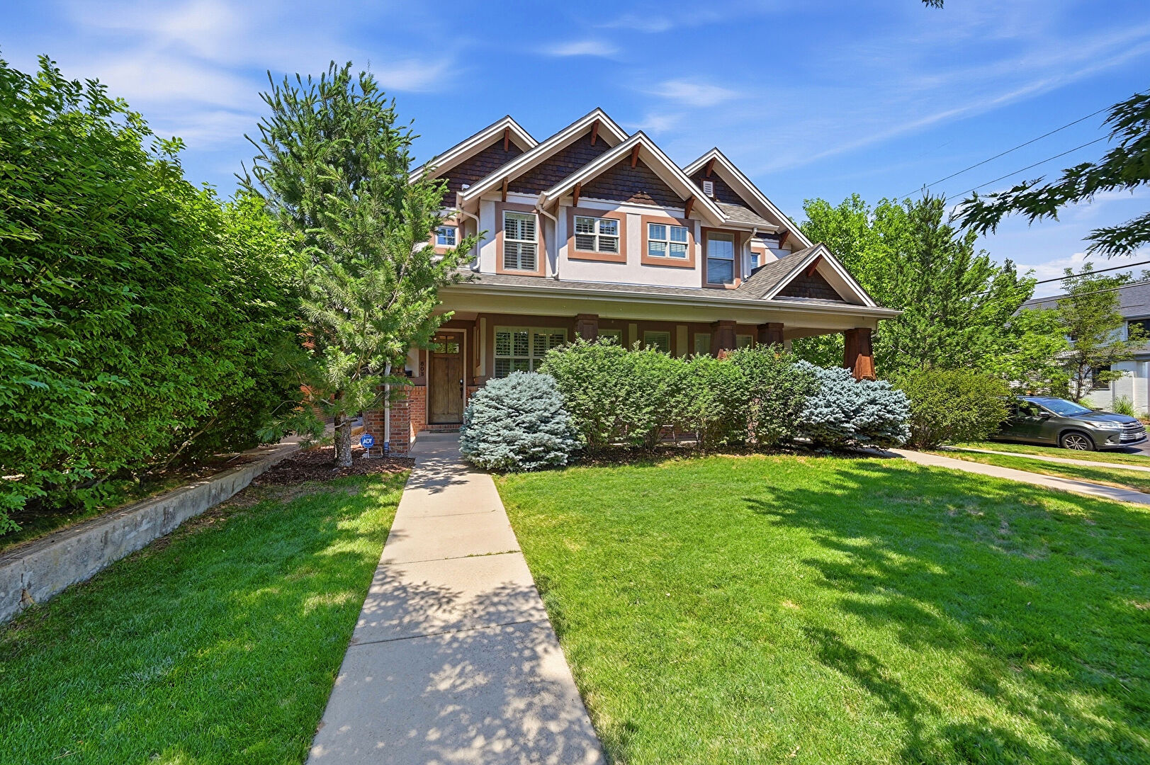 Front at 803 South Clarkson Street, Denver, CO 80209, listed by Colleen Simpson