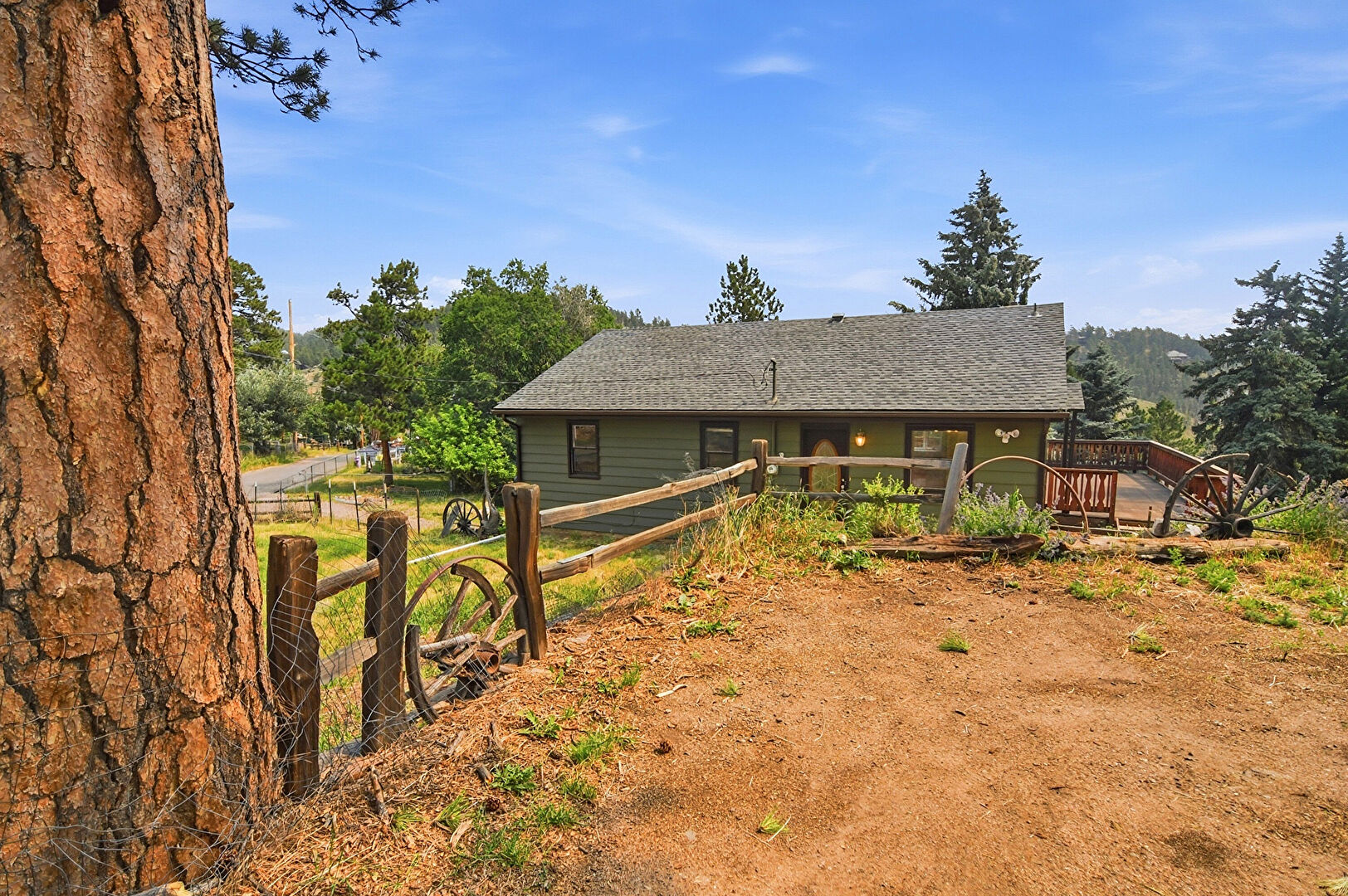 Front at 26277 South End Road, Evergreen, CO 80439, listed by Amy Good