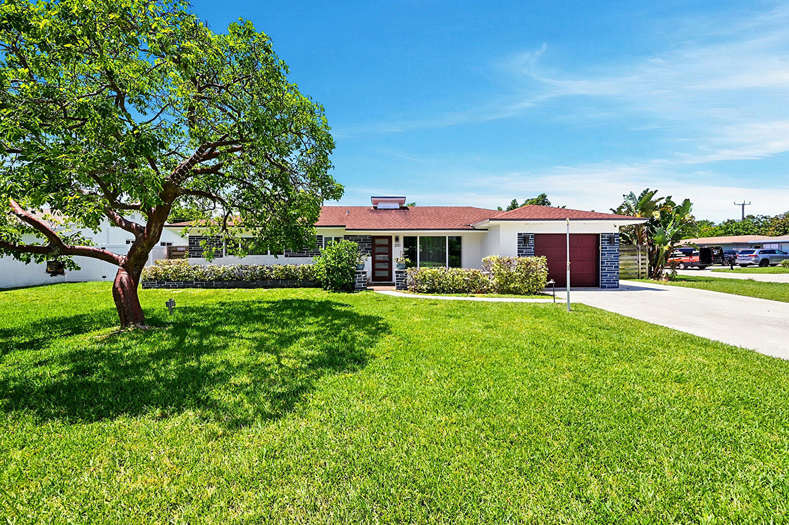 Front at 200 Northeast 28th Terrace, Boca Raton, FL 33431, listed by Deborah Carr