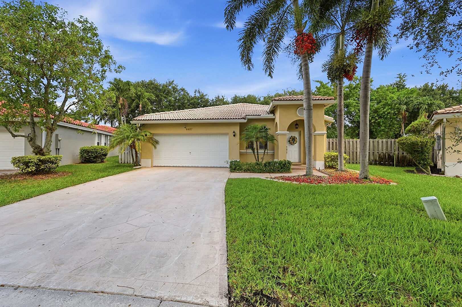 Front at 4487 Northwest 45th Terrace, Coconut Creek, FL 33073, listed by Laura Sanders