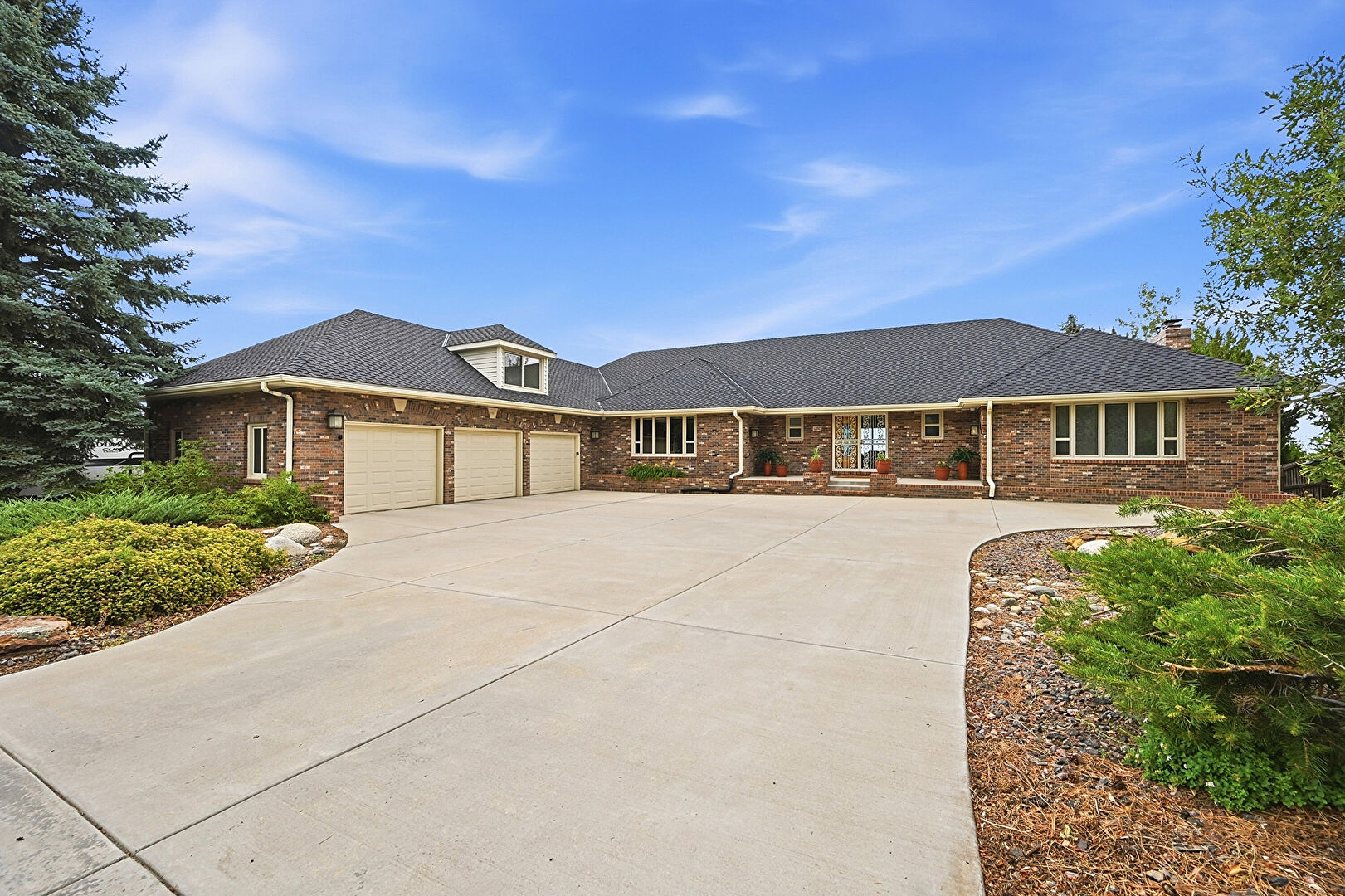 Front at 14337 West Exposition Drive, Lakewood, CO 80228, listed by Russ Porter