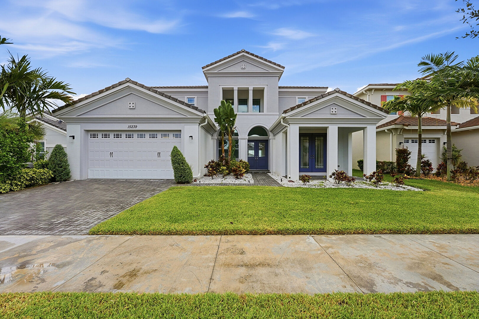 Front at 15239 Goldfinch Circle, Westlake, FL 33470, listed by Cheyenne Kirschbaum
