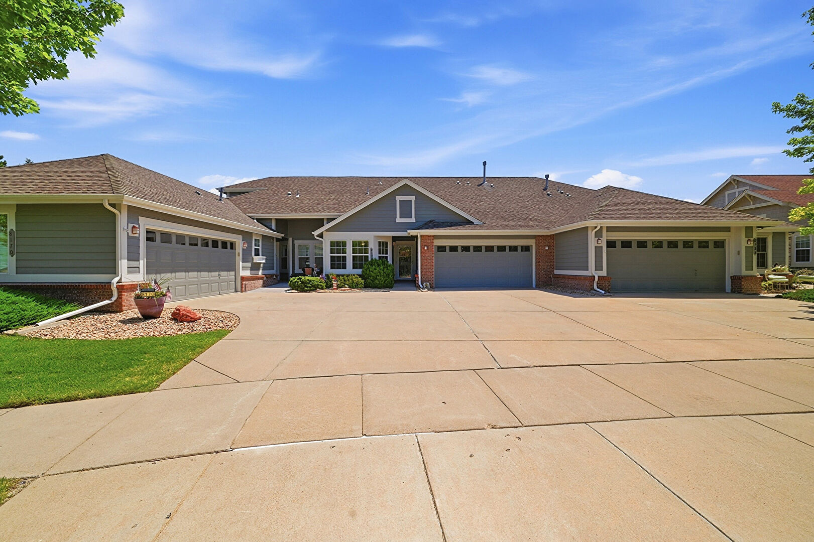 Front at 8176 South Winnipeg Court, Aurora, CO 80016, listed by Jeffery Uscier