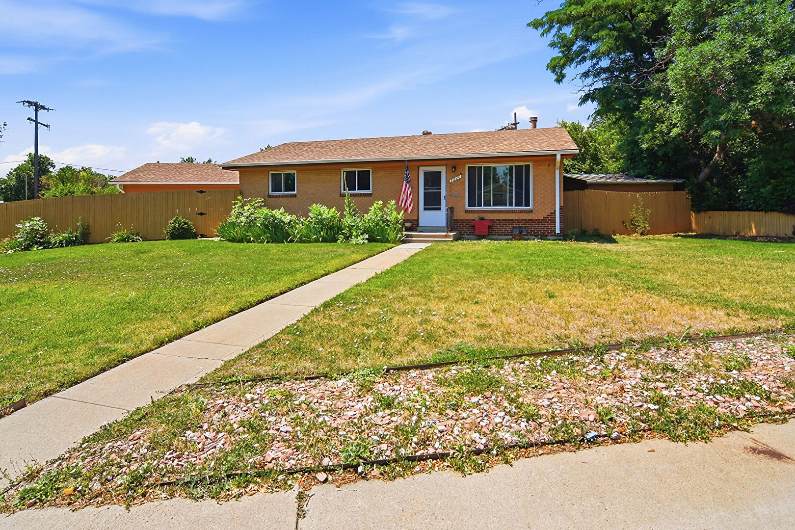 Front at 7220 West Calahan Avenue, Lakewood, CO 80232, listed by Tyson Murray