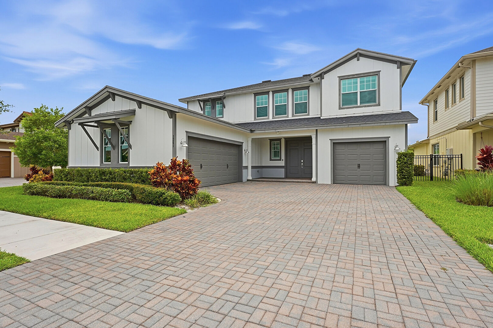 Front at 1261 Deer Haven Dr, Loxahatchee, FL 33470, listed by Ravi Mohanka