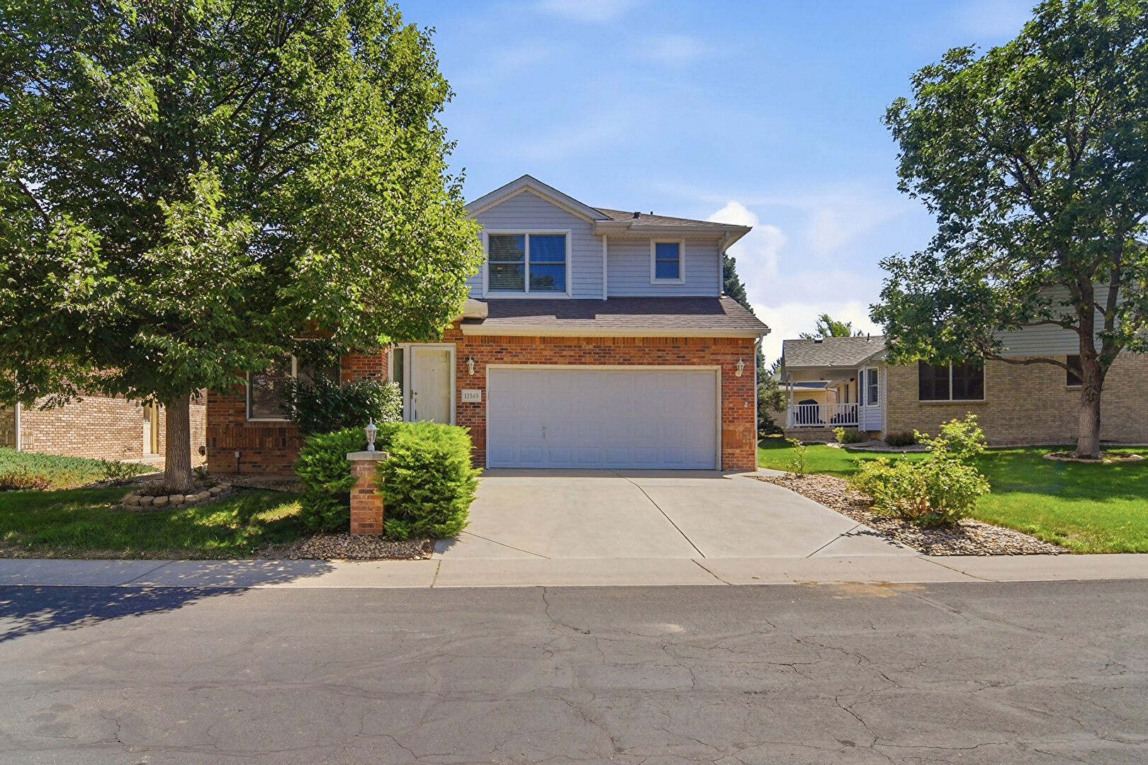 Front at 11349 E Louisiana Ave, Aurora, CO 80012, listed by Beth Gibson