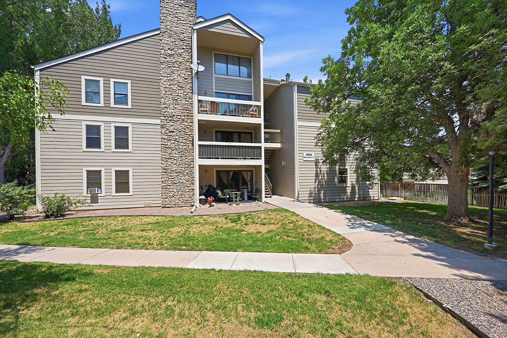 Property Exterior at 4896 South Dudley Street, Unit 10-1, Littleton, CO 80123, listed by Debra Graves