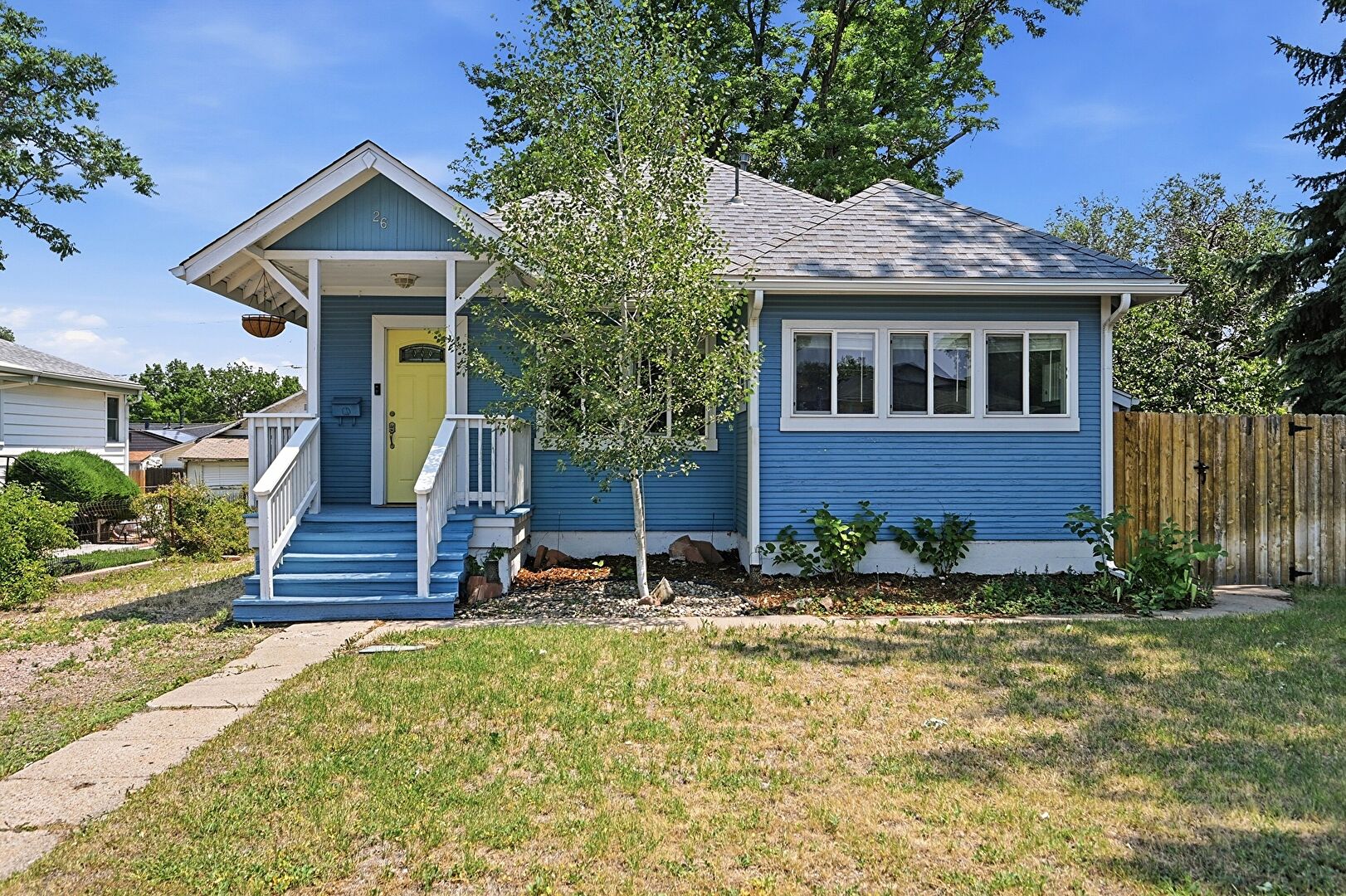 Front at 26 South Lowell Boulevard, Denver, CO 80219, listed by Joya Soell