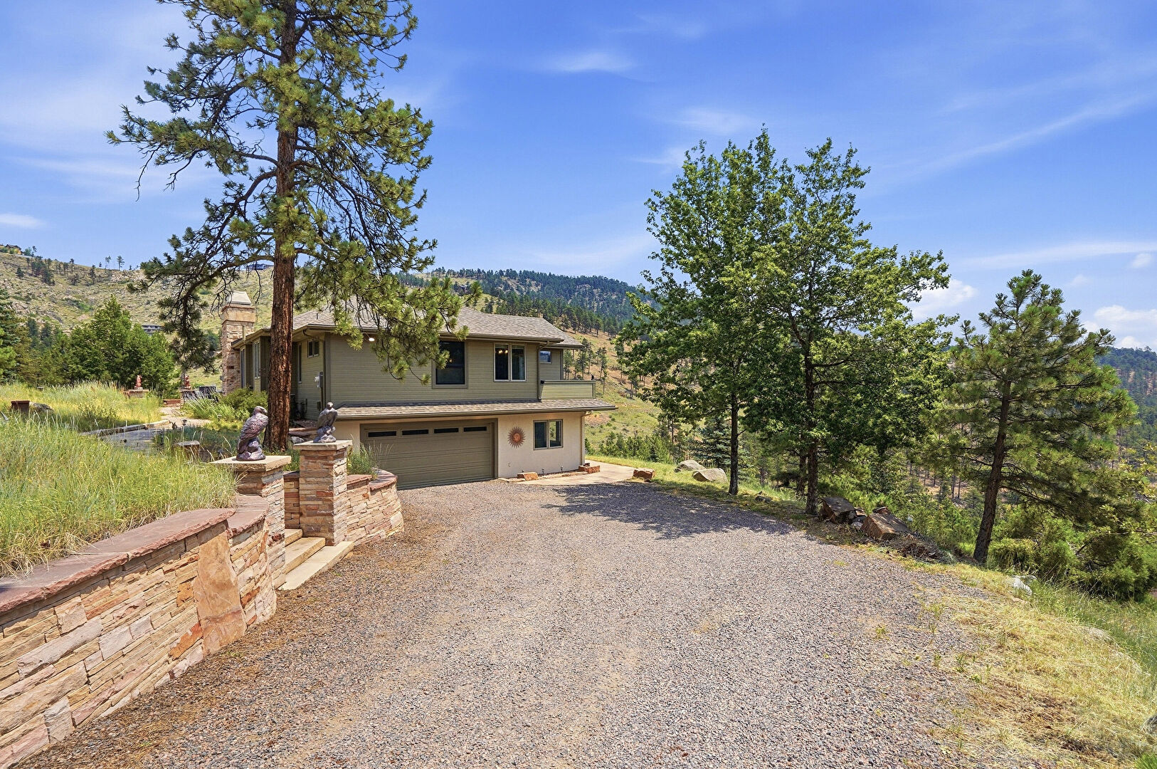 Front at 16 Camino Bosque, Boulder, CO 80302, listed by K.C. Golfinopoulos