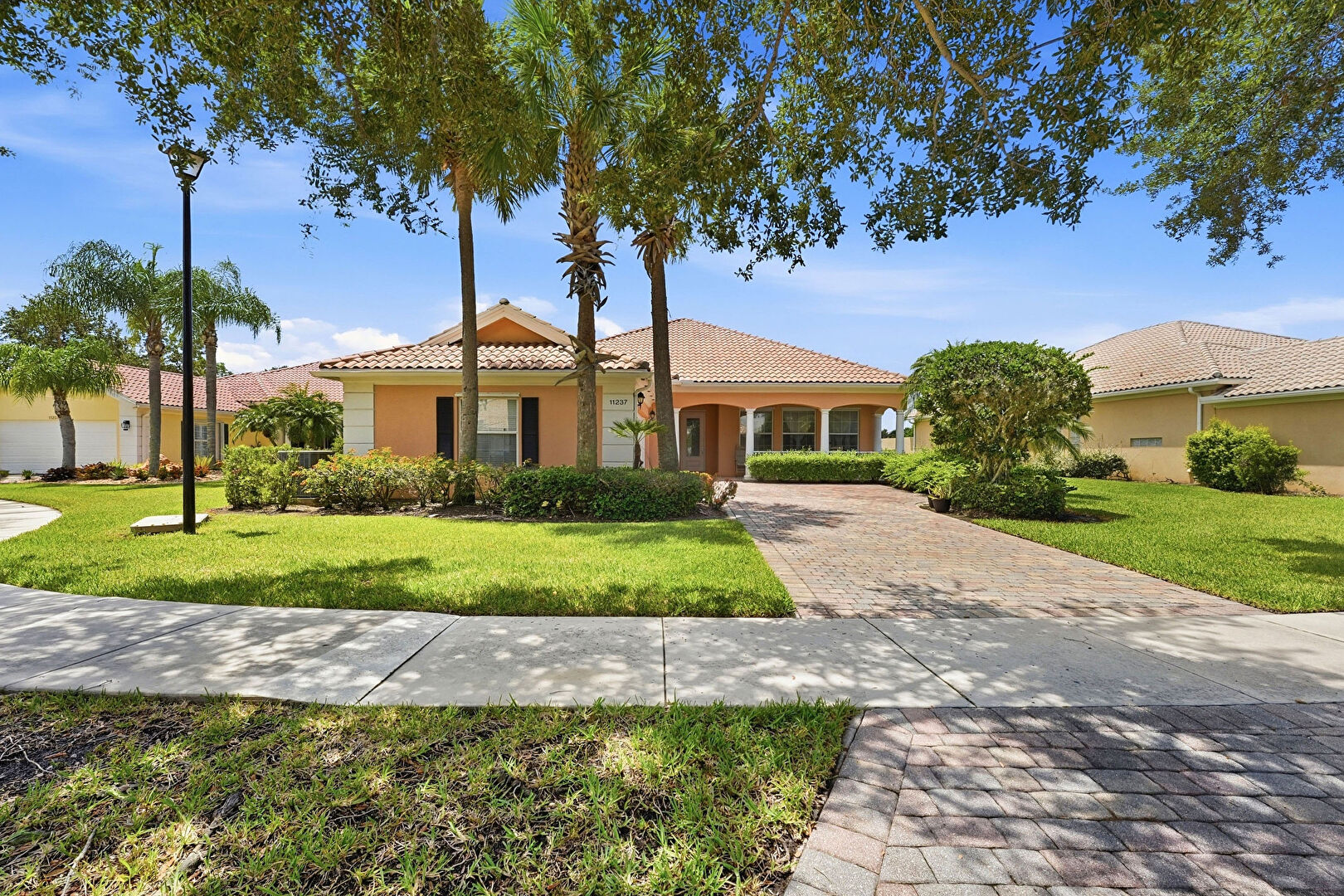 Front at 11237 Southwest Olmstead Drive, Port St. Lucie, FL 34987, listed by Jaclyn Anslow
